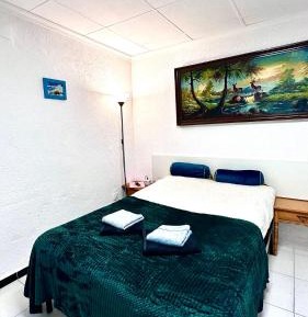 Quadruple Room with Private Bathroom