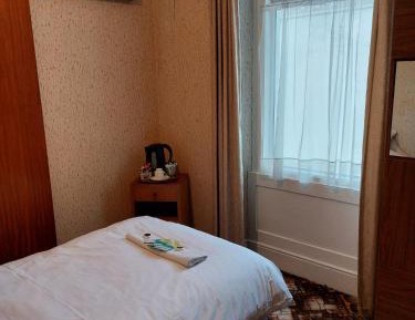 Standard Single Room with Shared Bathroom