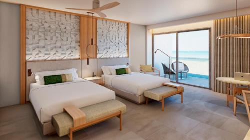 Serenity Club Partial Ocean View 2 Queen Beds Junior Suite