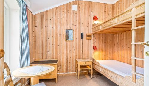 Single Bed in Dormitory Room