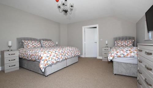 Deluxe Triple Room