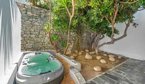 Deluxe Room with Outdoor Jetted Tub and Garden View