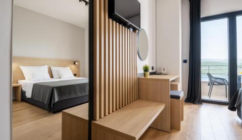 Triple Room with Balcony and Sea View