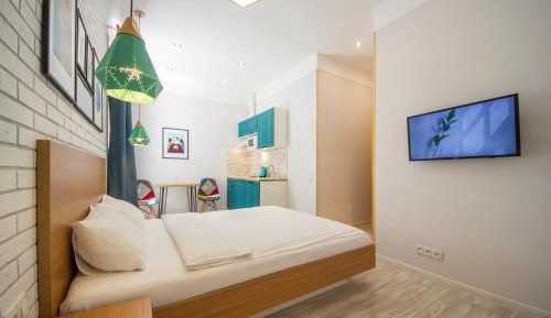 Design Apartment with balcony and with a view to the quite yard