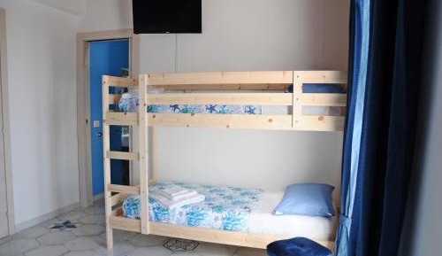 Quadruple Room with Private Bathroom