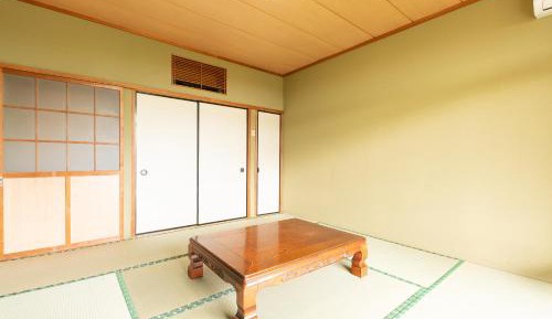 Quadruple Room with Shared Bathroom