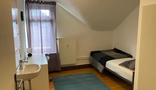 Single Room with Shared Shower and Toilet