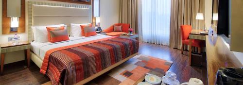 Premium Queen Room - Non-Smoking with Happy Hours (1+1 ;only applicable for IMFL not all the Brand at the bar),15% Discount on F&B,INR 500 Spa Credit