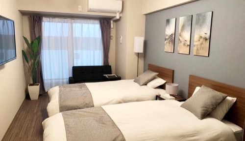 Standard Twin Room with Sofa - Non-Smoking
