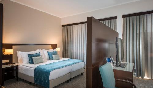 Junior Suite with Balcony and City View