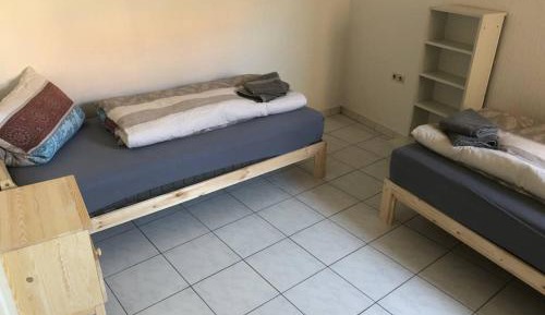 Economy Quadruple Room with Shared Bathroom