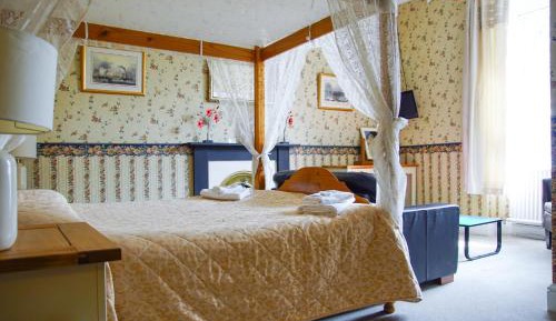 Room with Four-Poster Bed
