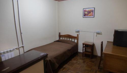 Queen Room with Shared Bathroom