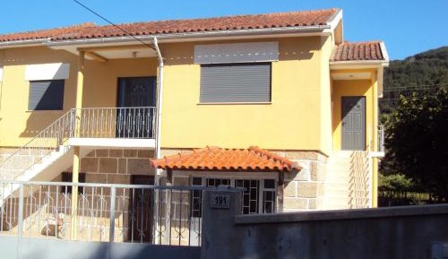 Two-Bedroom House with Living Room