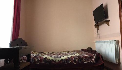 Economy Quadruple Room with Shared Bathroom
