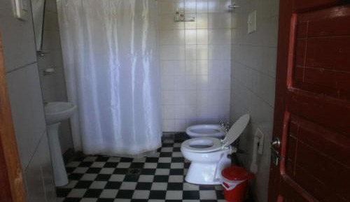 Single Bed in Dormitory Room