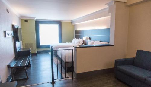Queen Suite with Two Queen Beds and Additional Living Area