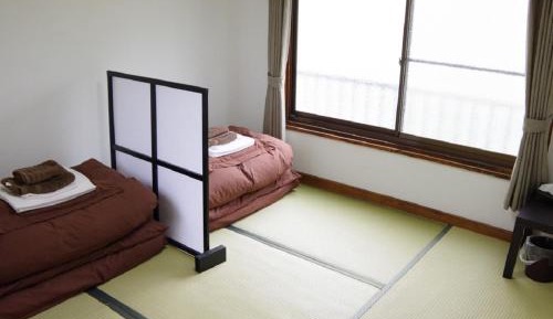 Single Bed in Female Dormitory Room