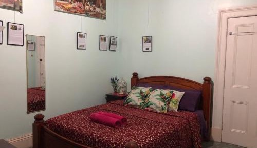 Queen Room with Shared Bathroom