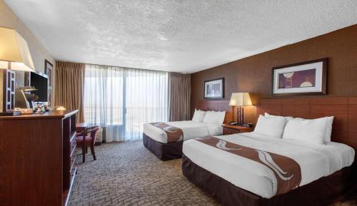 Standard Queen Room with Two Queen Beds with Balcony and Pool View - Non-Smoking