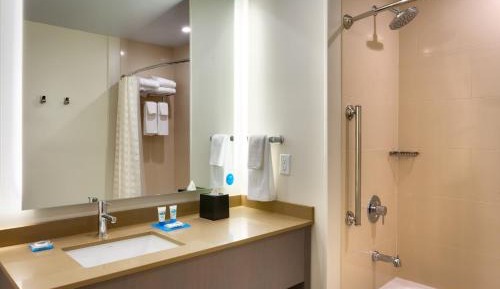 Specialty One-Bedroom Corner Suite with Two Queen Beds, Sofa Bed and Kitchen
