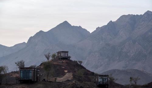 Standard Lodge with Scenic Mountain Backdrop and Adventure Activities