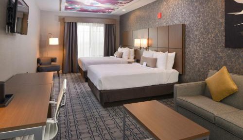 One Bedroom Queen Suite with Two Queen Beds and Sofa Bed