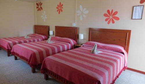 Room with Three Double Beds