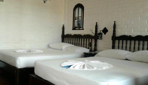 Double Room with Two Double Beds (1-4 Adults)