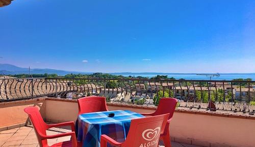 One-Bedroom Apartment with Terrace and Lake View - Second Floor