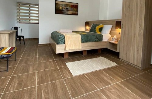 Aburi Apartment | The Treehouse Studio apartments with a large rooftop terrace.