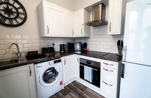Castle Apartment | Converted Chapel Swansea | King Bed | Sleeps 4.