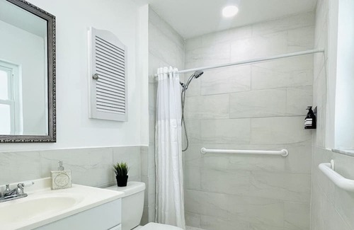 Largo House | Beach Resort Retreat Accessible Home with swim spa jacuzzi