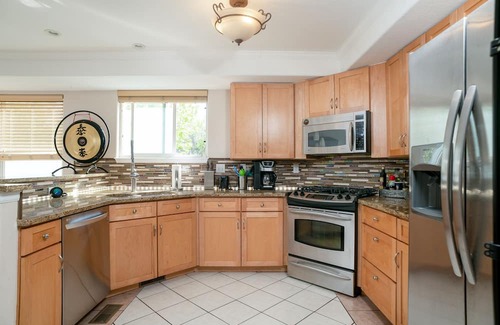 Curtis Park House | 4-Bedroom Party Palace with Theater Room, Game Room and Hot Tub