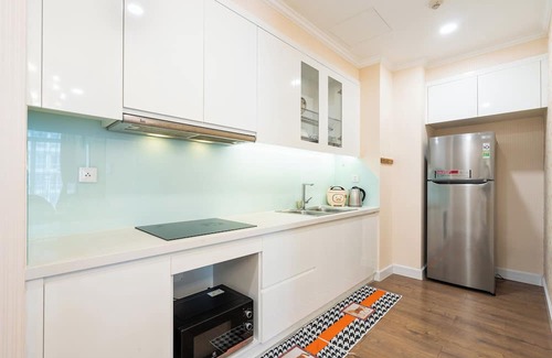 District 9 Apartment | Lumière Riverside by Urban Home