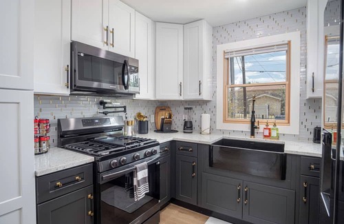 Eastside Promise Neighborhood House | Stylish Stay With Unforgettable Downtown Views!