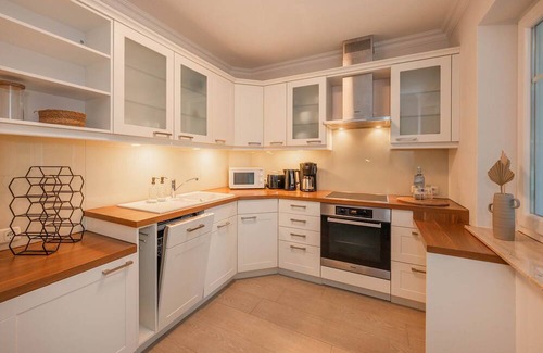 Zinnowitz Apartment | Quartier am Kirchberg - 02 - quiet residential complex with conservatory and fireplace