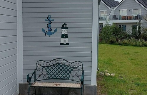 Olpenitz House | Anchorage - infrared sauna, fireplace, shower, bathtub, terrace, parking space