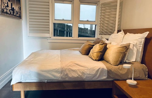 Cremorne Apartment | Modern, private garden apartment. 5 mins from beach. Pet friendly!