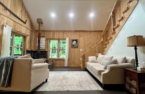 Muddy Pond Cabin | Secluded cabin beside private river, surrounded by peaceful nature