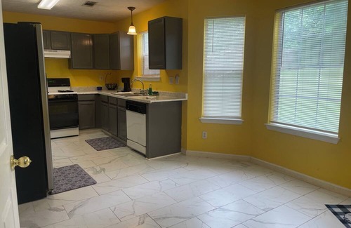 Lithonia House | 4-bedroom home in welcoming Stonecrest with WiFi, fitness area, AC
