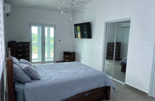Florida House | Cozy 2-bedroom house in peaceful Vieques with AC, WiFi, pool and more