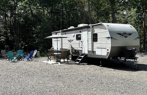 Gardiner House | small campground in the woods with a very unique bath house