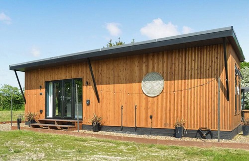 Storwood Cottage | We just love the outside entertainment area with a bath for two, table top fire pit and large Smart