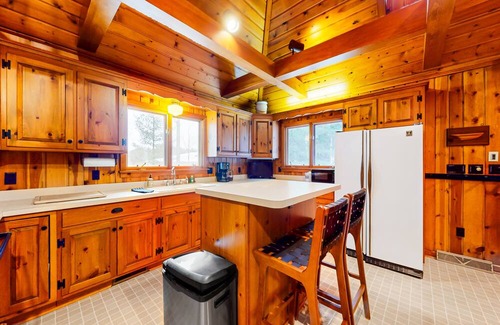 Minocqua House | Lakeside retreat with four bedrooms, yard, dock, balcony, & washer/dryer