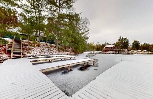 Minocqua House | Lakeside retreat with four bedrooms, yard, dock, balcony, & washer/dryer