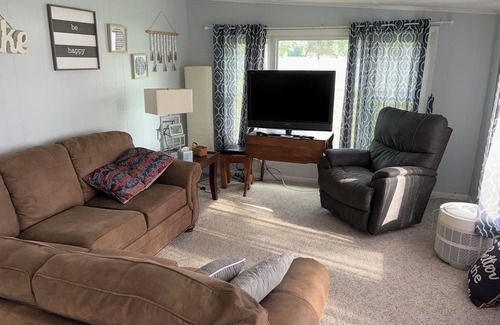 Fremont Cottage | Lake Front Cottage with a beautiful park like setting!