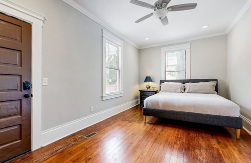 Metropolitan House | Dog-friendly duplex with front porch, fenced yard & walkable location