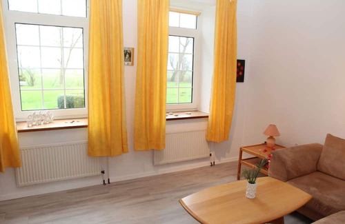 Uttum Apartment | Gemütliche Erdgeschosswohnung im Müllerhaus der Uttumer Mühle - Uttumer Mühle