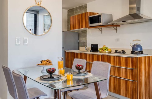 Avenida Revolucion Apartment | Amazing Apt w/a Pvt Balcony: Lounge-B/Center+Gym